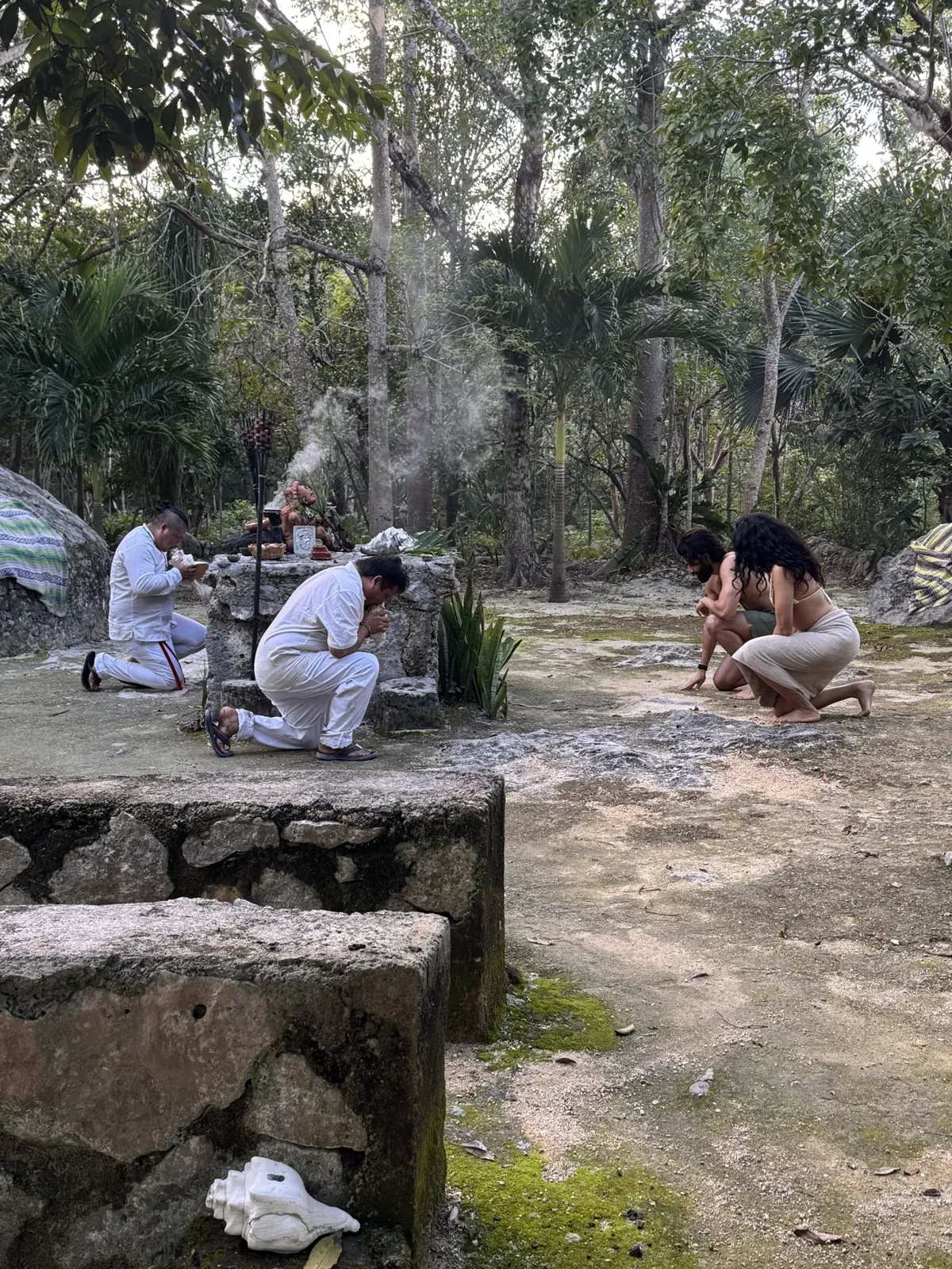 Local guides gathering with guests near the temazcal ceremony area